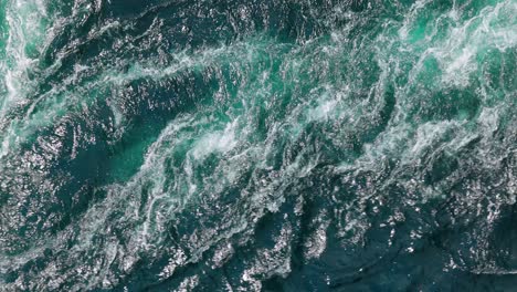 Blue-waves-of-water-of-the-river-and-the-sea-meet-each-other-during-high-tide-and-low-tide.