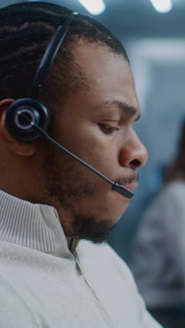 businessman wearing headset in call center