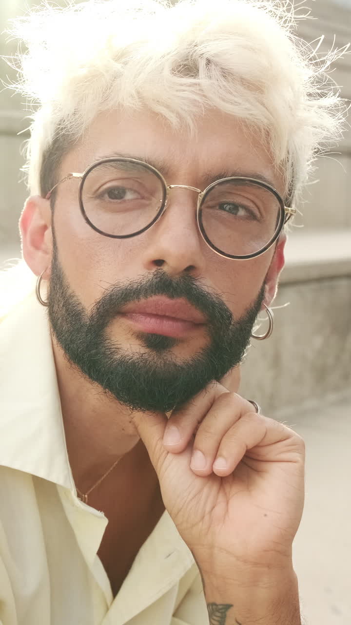Close-up Portrait of a Thoughtful Man with Glasses and Beard