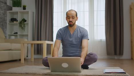 man talking with his friends on video call