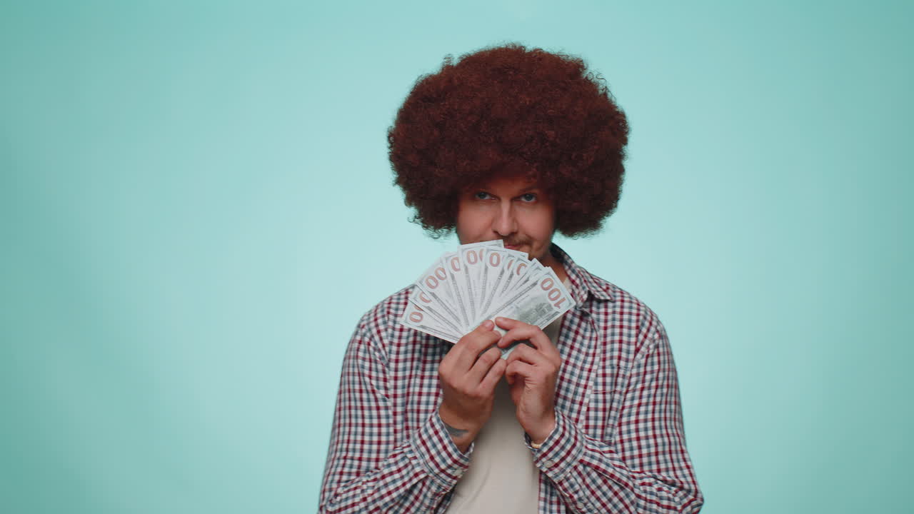 Rich pleased boss man waving money dollar cash, success business career, lottery winner, big income