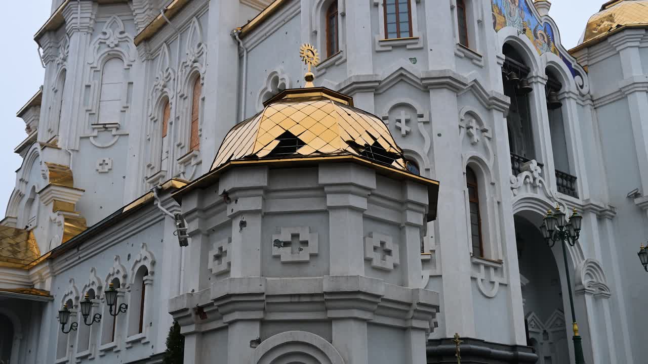 Evidence of shelling on a cultural site in Kharkiv, Ukraine. The Holy Myrrh-Bearing Women Church shows extensive shrapnel damage, a result of attacks on civilian areas