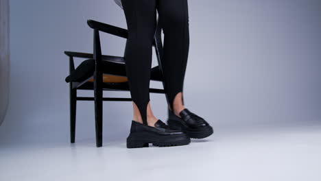 black leggings and platform loafers fashion shoot