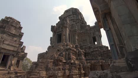 ruins of ta keo temple and the sanctuary towers in angkor thom, cambodia, cinematic point of view pov