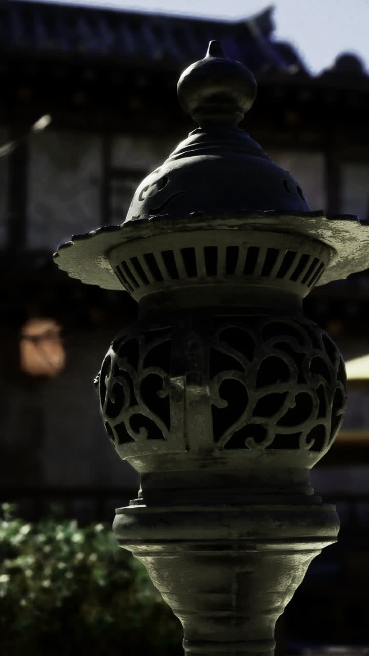 Lantern illuminates tranquil courtyard at historic japanese location