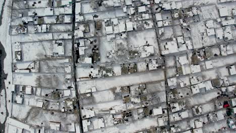 top done view of congested snow covered skardu city in pakistan