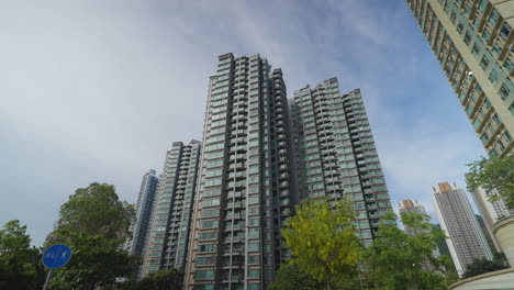 urban skyline symmetry: gimbal shot of hong kong residential buildings in perfect balance