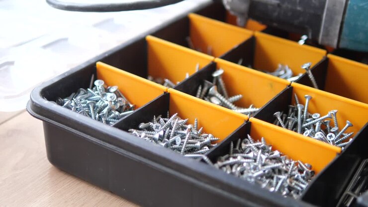 Close-up of screws in a tool box