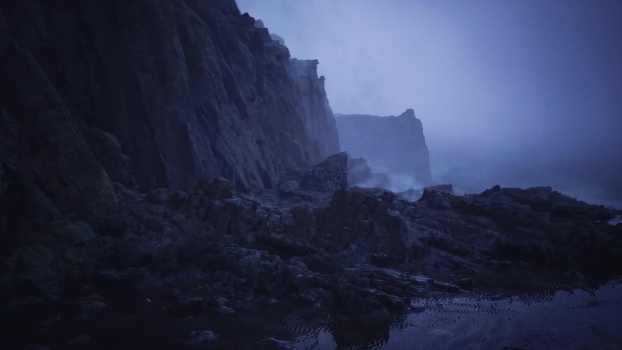 Overcast fog surrounds rugged cliffs adjacent to serene reflective pools