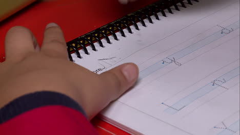 child practicing handwriting