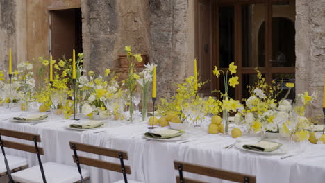 outdoor elegant yellow floral dinner table setting