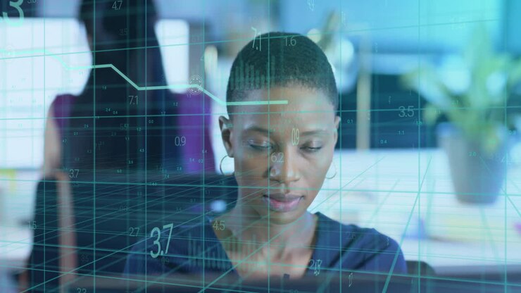 Animation of financial data processing over african american businesswoman working in office