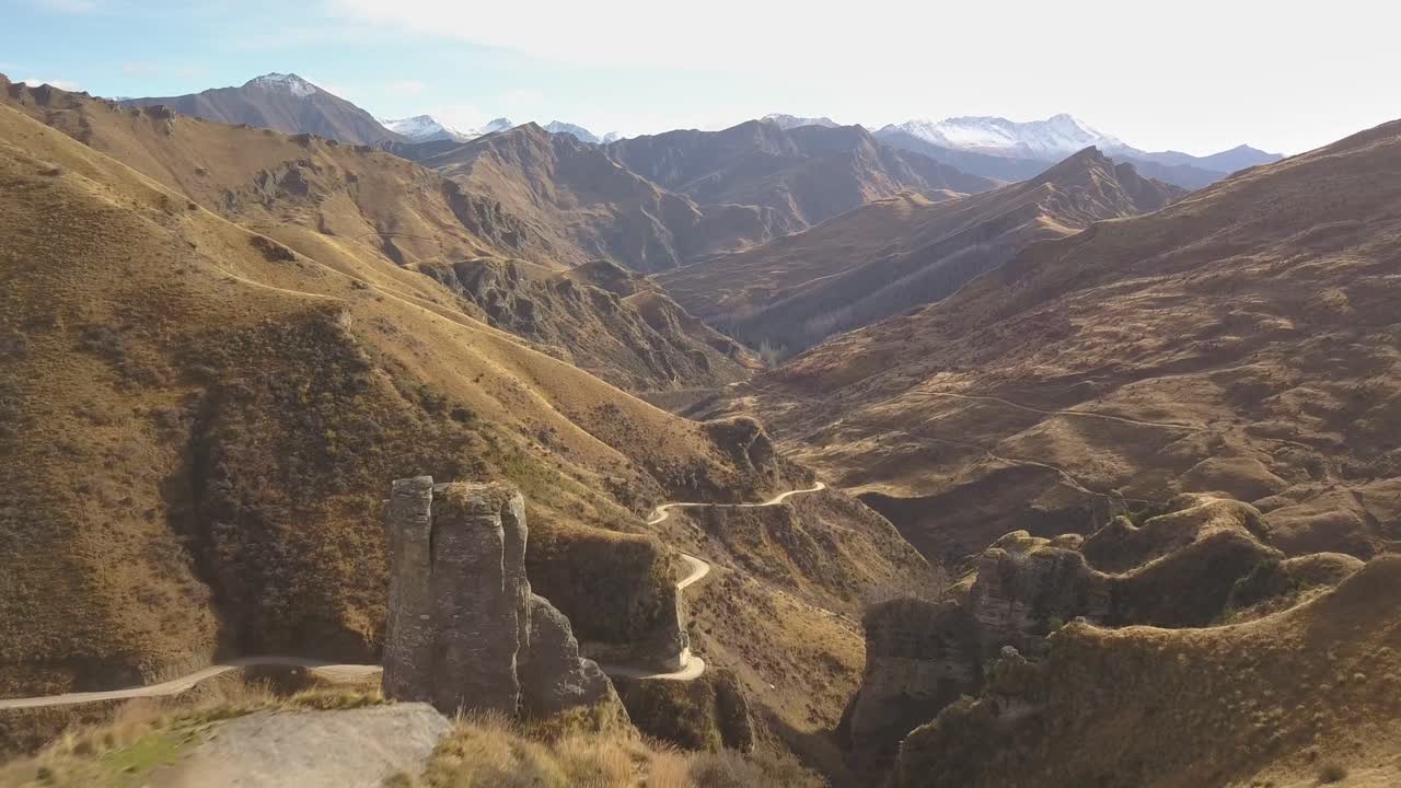 Aerial View of a Winding Mountain Road in New Zealand