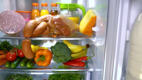 open refrigerator filled with food