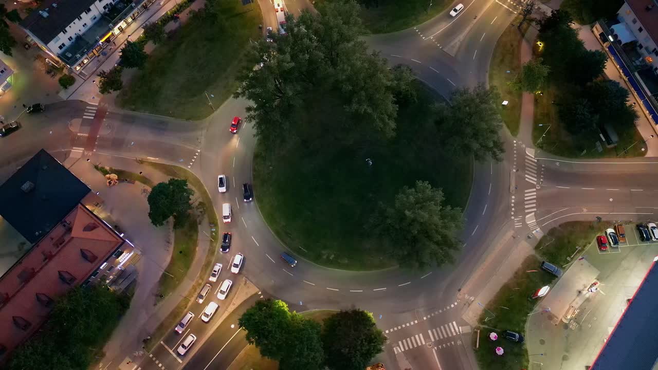 Drone shot of a roundabout traffic circle in twilight
