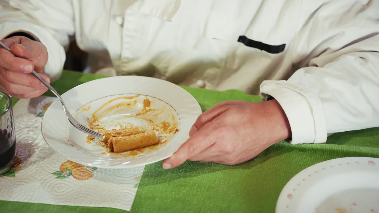 Person Eating Pasta