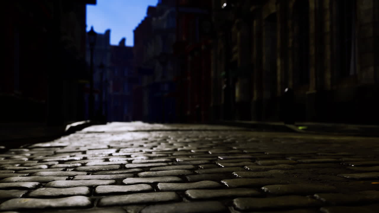 Cobblestone street illuminated by evening light in a historic urban area