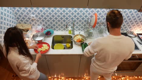 Couple Cooking Together in a Cozy Kitchen