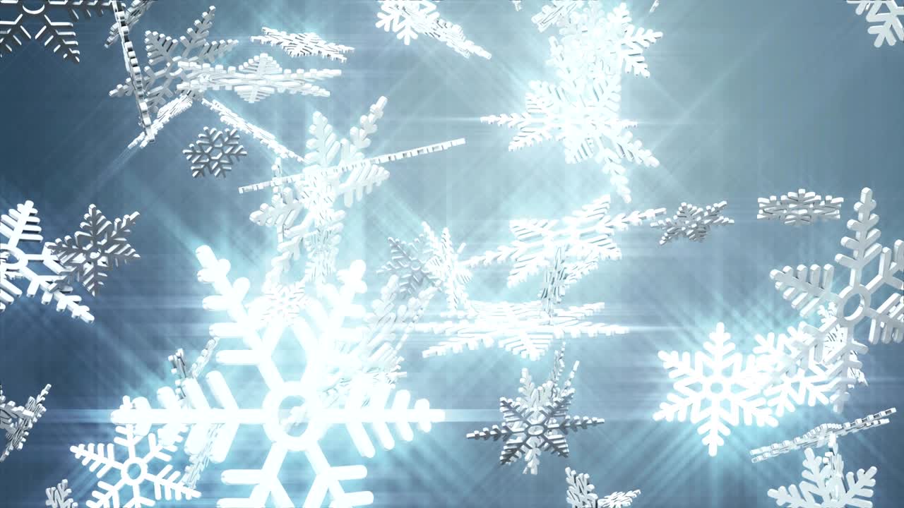 회색 배경에 눈송이가 떨어집니다.