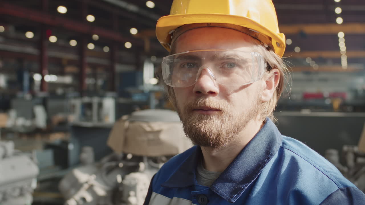 Portrait Of Plant Engineer In Hard Hat And Safety Glasses