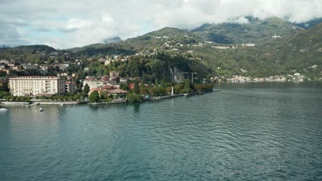 aerial: coast of menaggio town in lake como on a sunny day