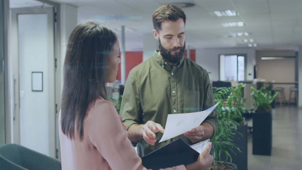 Man offering sheet triggers co-workers reviewing documents, blue waveform marking business points