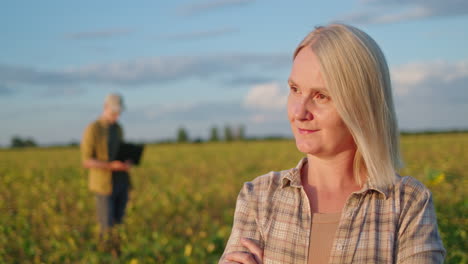 woman farmer in soybean field