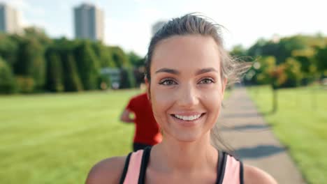 Portrait-of-sporty-woman-in-the-park,-Katowice,-Poland