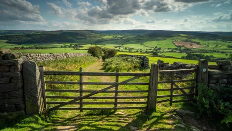 A-timelapse-of-the-sunlight-passing-across-a-gated-path-at-Oakley-Walls-in-the-North-York-Moors-National-Park-during-late-summer