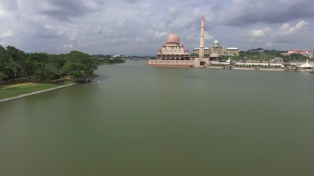 Drone approaching the beautiful Putra Mosque in Putrajaya, Malaysia