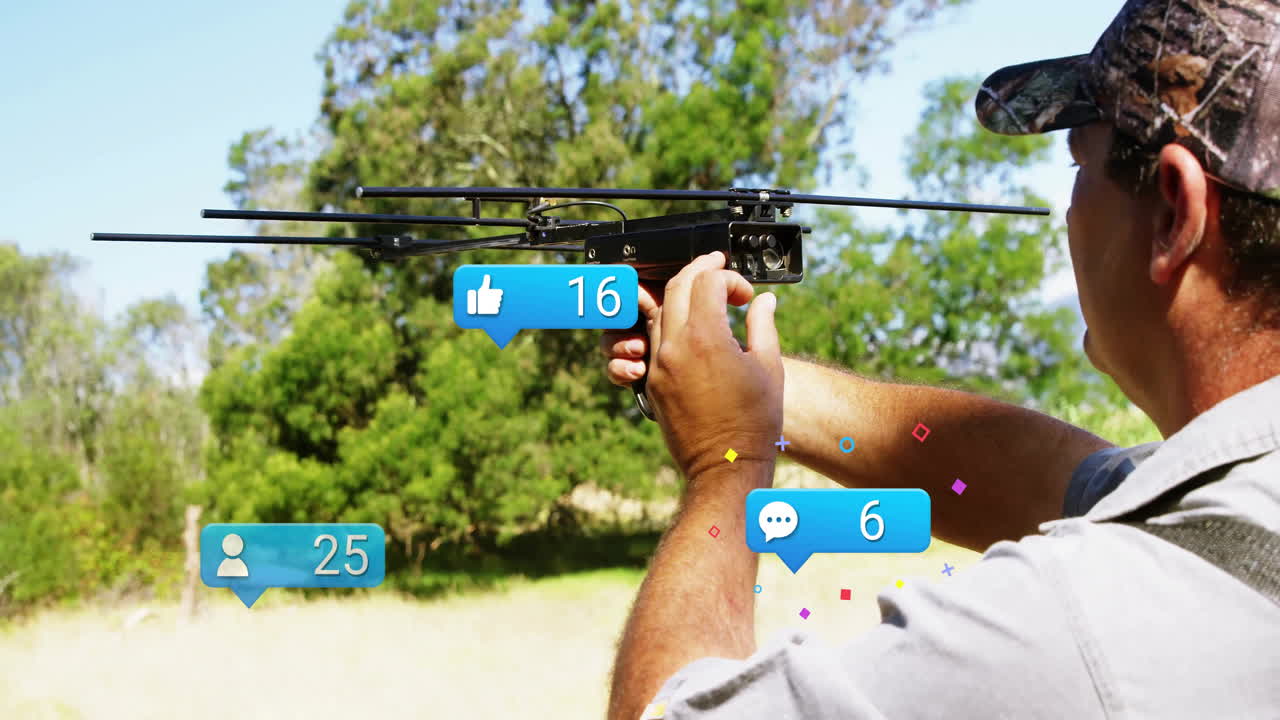Man adjusting antenna device in sunlit field, showcasing floating social media notification icons