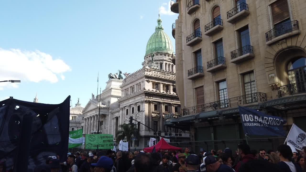 Crowd of Argentinian people march at National Buenos Aires congress for Public University funds, Gathering of urban protestors