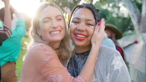 two happy friends enjoying a festival