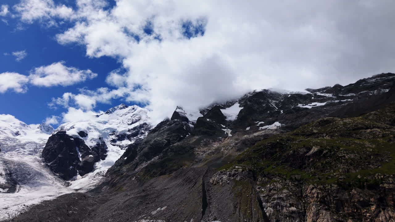 Majestic Alpine peak in Morteratsch, Switzerland under a bright sky