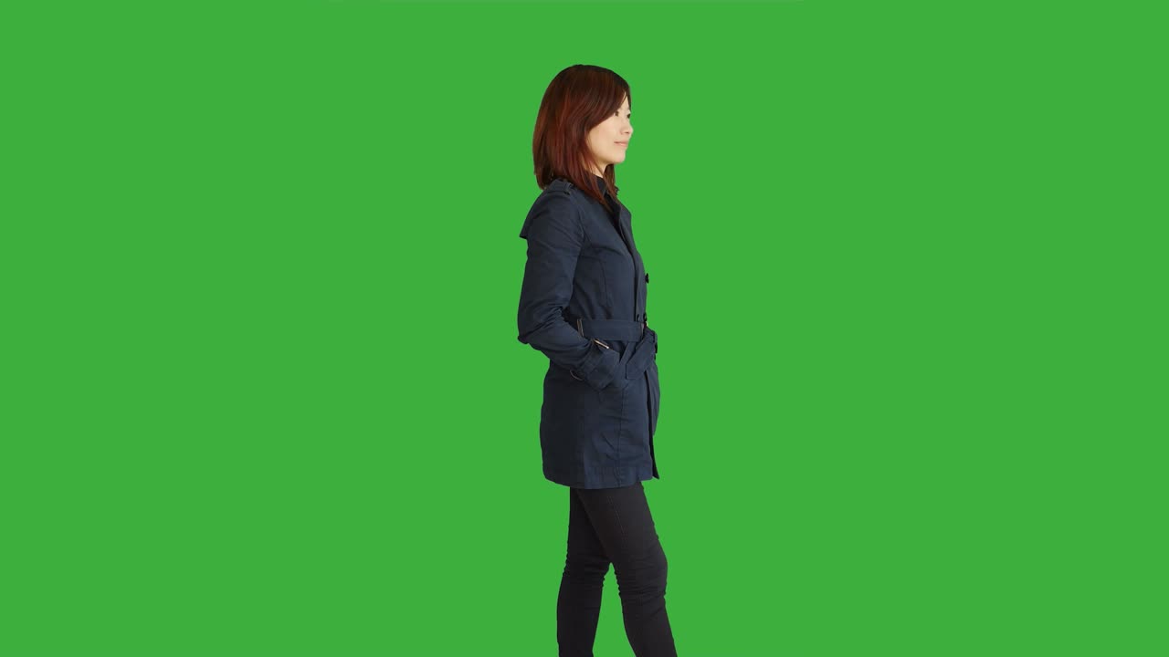 Young Asian Women Standing Isolated Against Green Screen Background. Portrait of Chinese Female Person.