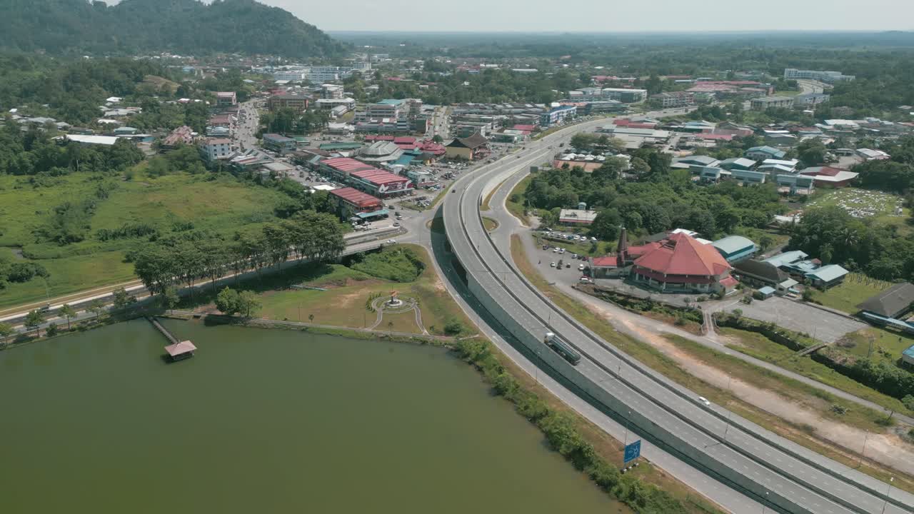 Aerial Drone View, Serian District Town ,Summer With Beautiful Green Trees,New Building And Water Park Lake, Water From The Mountain Sarawak,Borneo.