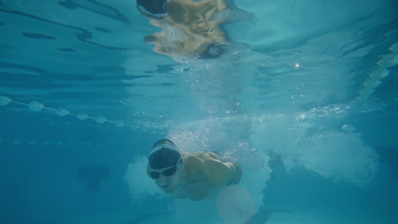 Underwater swimming in a pool