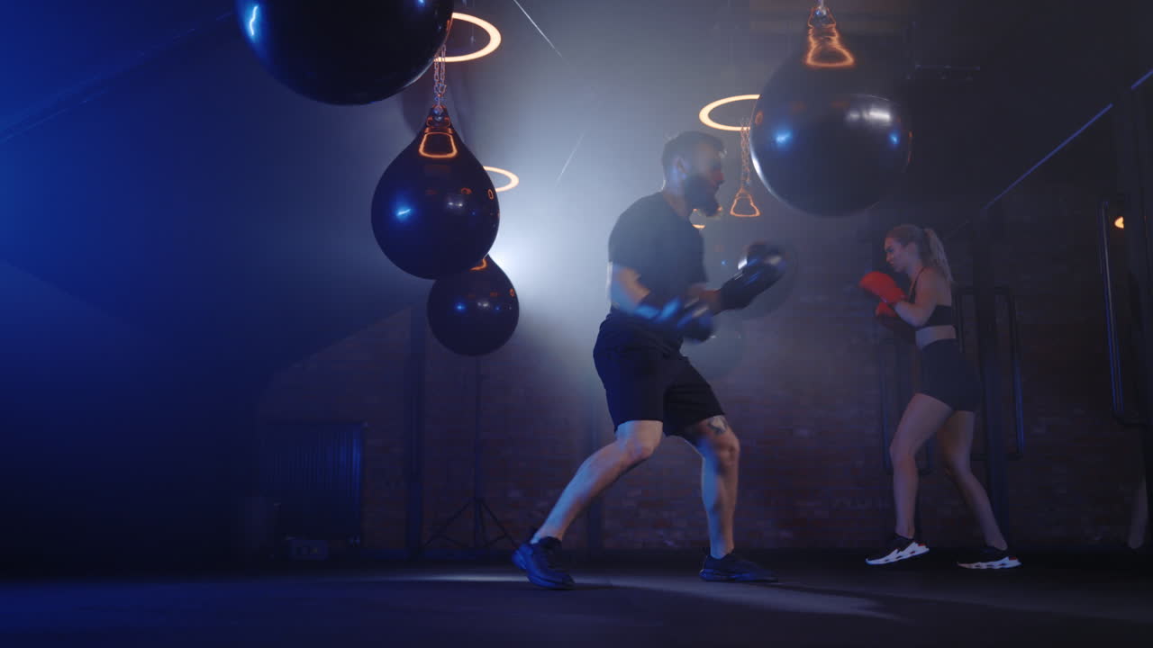 Boxing Training Session with Two Athletes