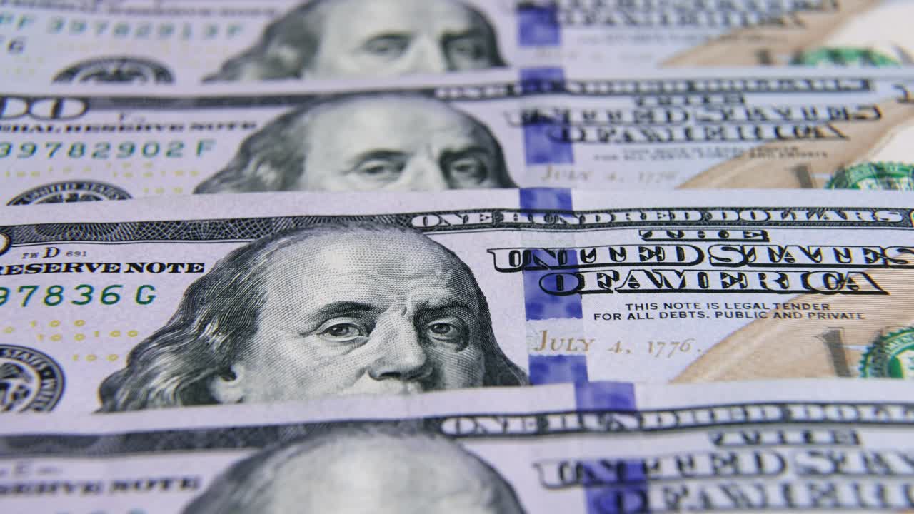 USD Dollar banknotes, paper money, exchange rate currency. Cash banknotes. The concept of finance and investment. hundred US dollars. business economics