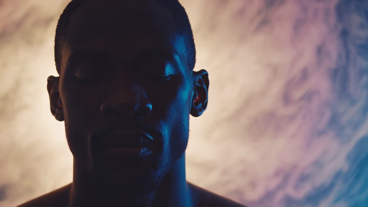 Close-up portrait of a dark-skinned man