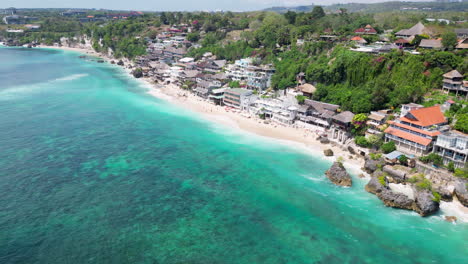 High-Angle-Drone-Shot-Of-Crystal-Clear-Bingin-Beach-Tracking-Out-To-Sea-Bali-Indonesia