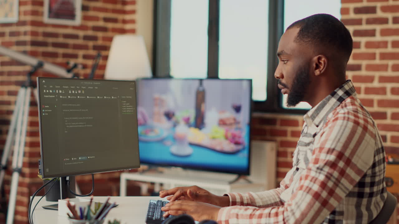Software developer programming html code on computer