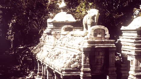 ancient stone temple ruins with elephant statue