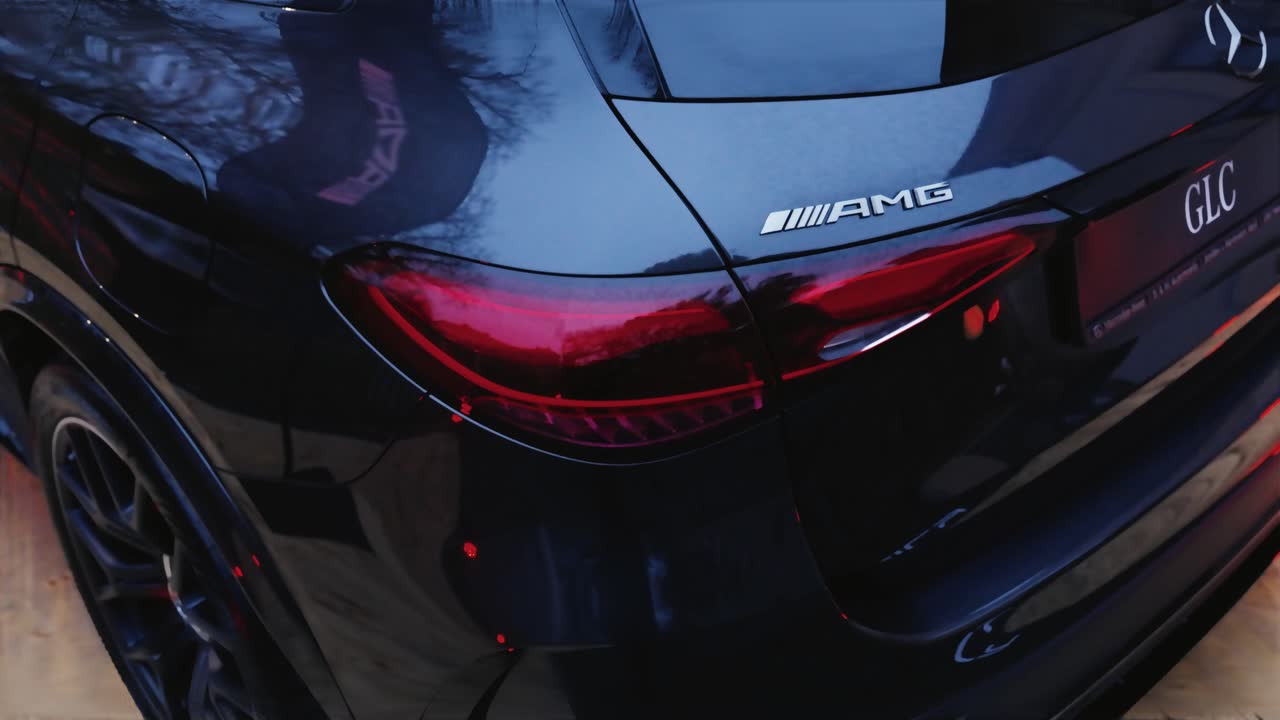 Slow tilt down while taillights blink and activate on vehicle, Czechia