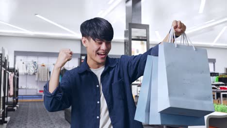 happy shopper with shopping bags