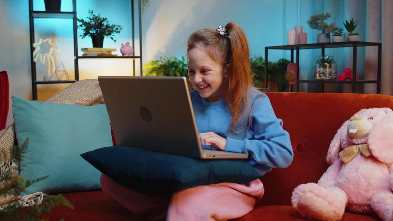 Amazed teen girl use laptop computer receive good news message shocked by victory celebrate win