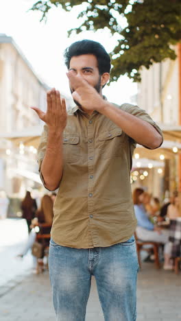 cheerful rich adult man showing wasting throwing money win lottery share celebrate in city street