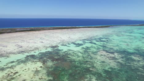 Breathtaking-aerial-view-of-coral-reef-in-Los-Roques-National-Park,-Venezuela