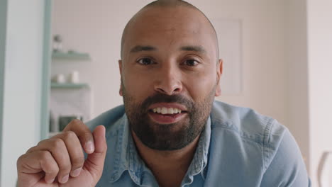 attractive-young-man-having-video-chat-using-webcam-at-home-waving-at-baby-sharing-lifestyle-father-enjoying-online-connection-on-horizontal-screen