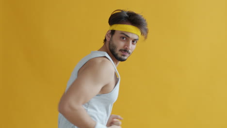 man in 80s running outfit